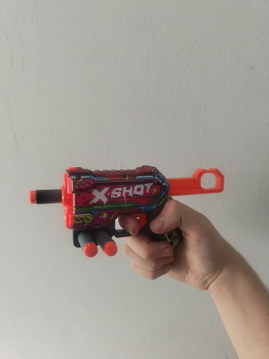 Mały zabawkowy pistolet X-SHOT