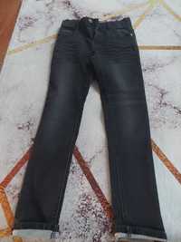 Nowe-czarne dżinsy,rozmiar  134 ,cena 40 zł zł