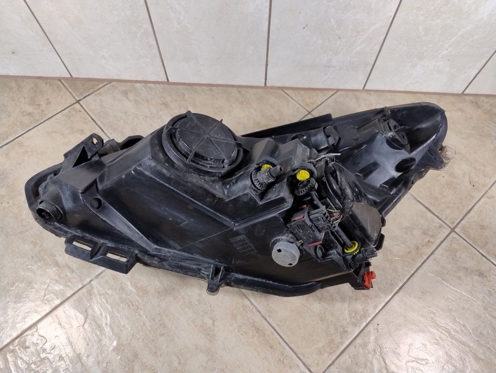 Lampa reflektor prawy przód Opel Corsa D  europa Tyc wysyłka
