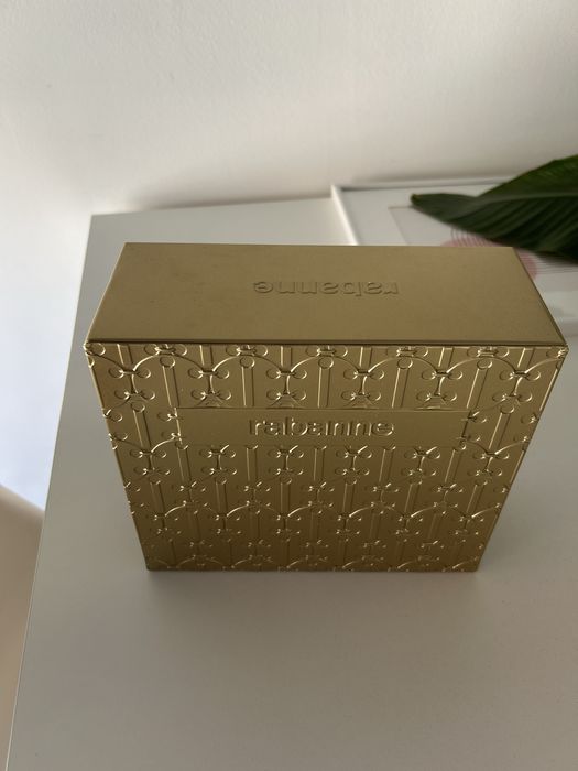 Caixa paco rabanne dourada
