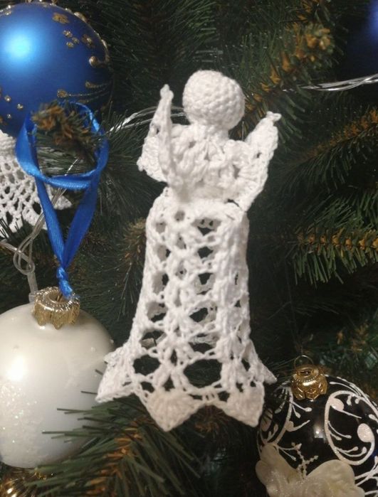 В'язані вироби: сніжинки, ангели, шари для декорації, чашки