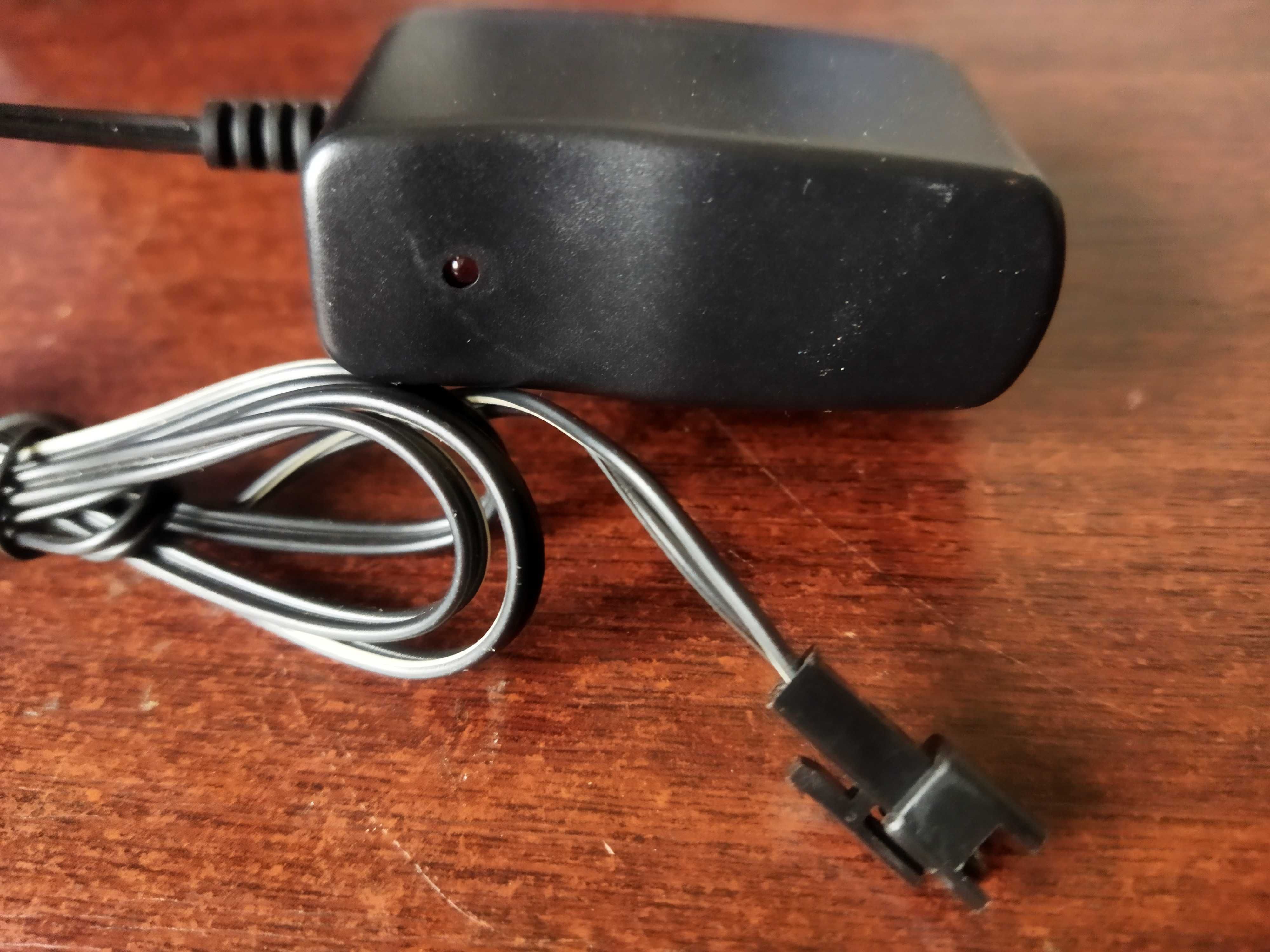 Зарядное устройство AC\DC Adapter 4V 0.2Ah аккумулятора игрушки.
