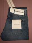 Wyprzedaż spodnie męskie Calvin Klein Jeans.