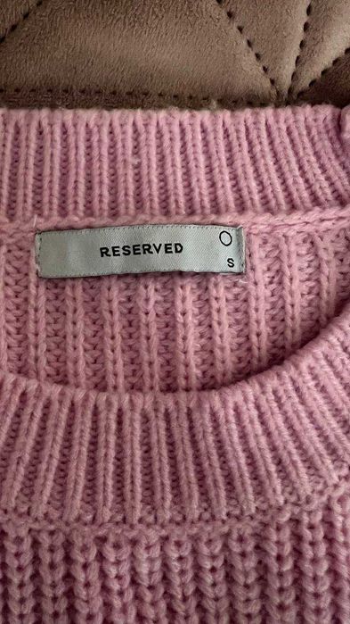 Светр у рожевому кольорі