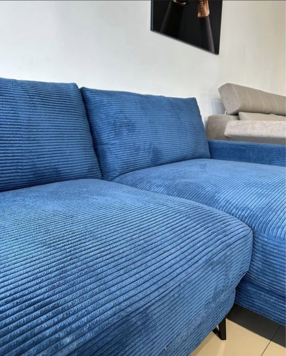 Кутовий нерозкладний диван,синій,з пуфом