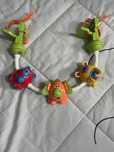 Brinquedo arco com música para carrinho ou cama de bebé NOVO