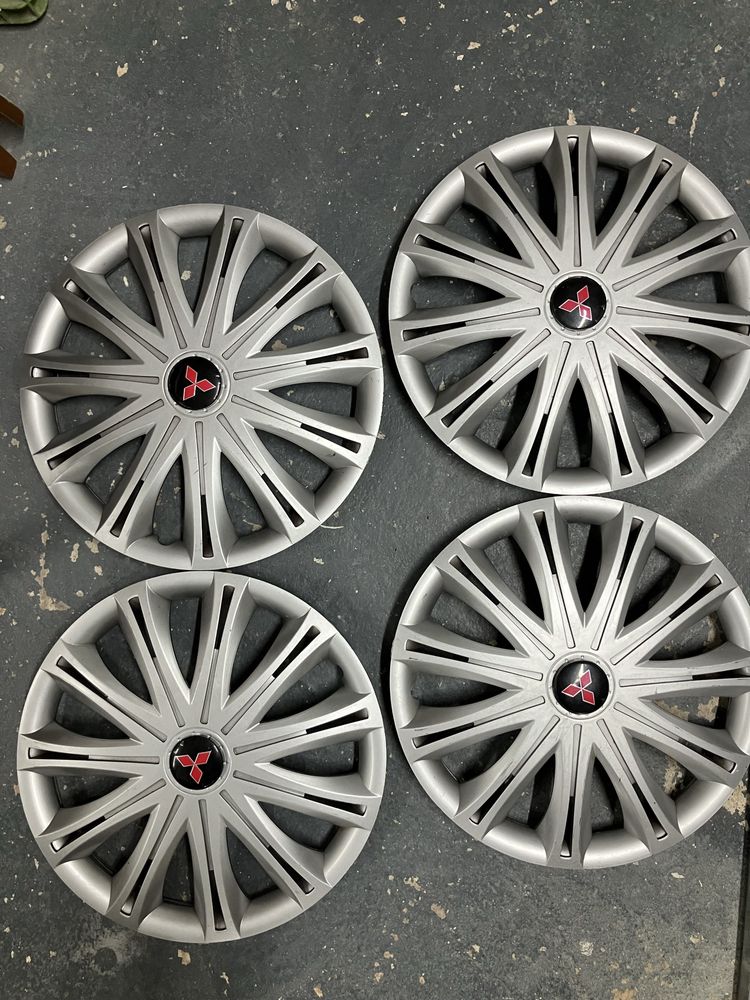 Tampões de Rodas 15”e 16”+ChaveRodas+Sup.TLM,+Encosto Cabeça Mitsubish