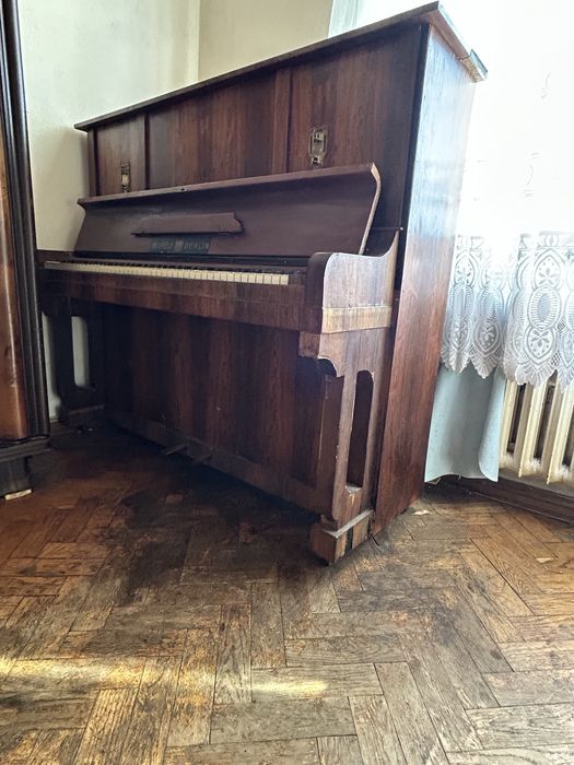 Pianino uzuwane Neufeld
