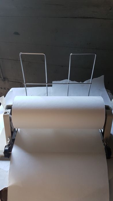 Пристрій подачі рулонного паперу в принтер