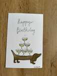 Kartka urodzinowa jamnik dachshund szampan boho birthday