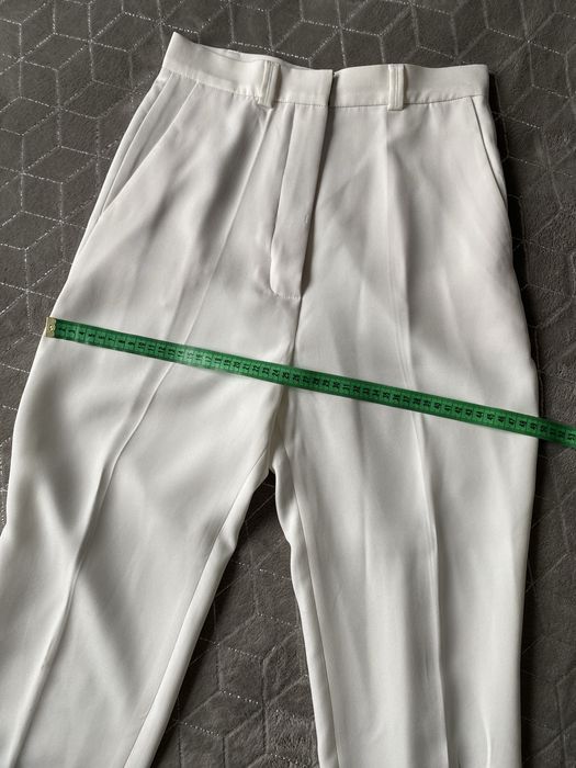 Костюм молочного кольору san_mois. Розмір S-M.