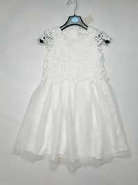 Біла сукня для дівчинки.