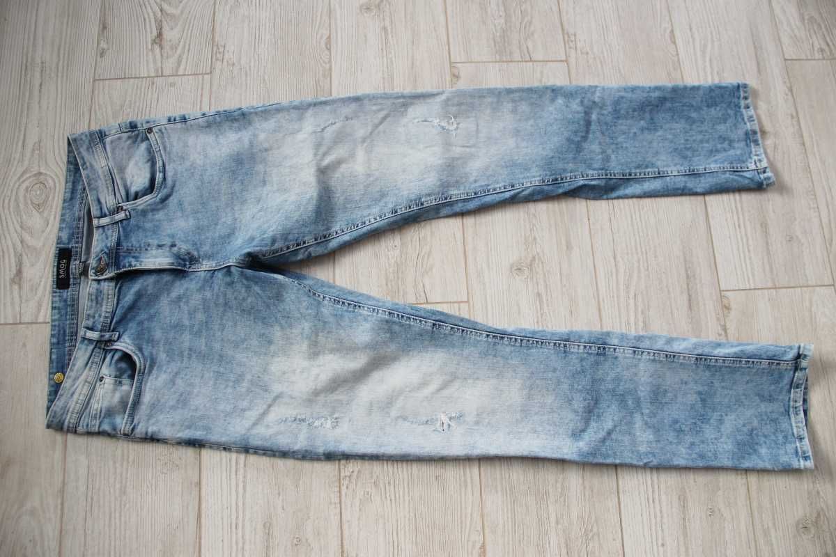 Męskie spodnie Jeansy Smog rozm XL