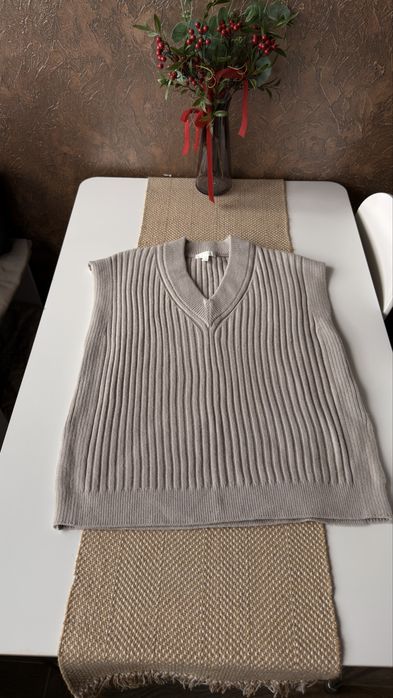 Тепла жилетка HM