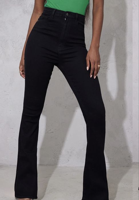 Джинси чорні кльош нові хс