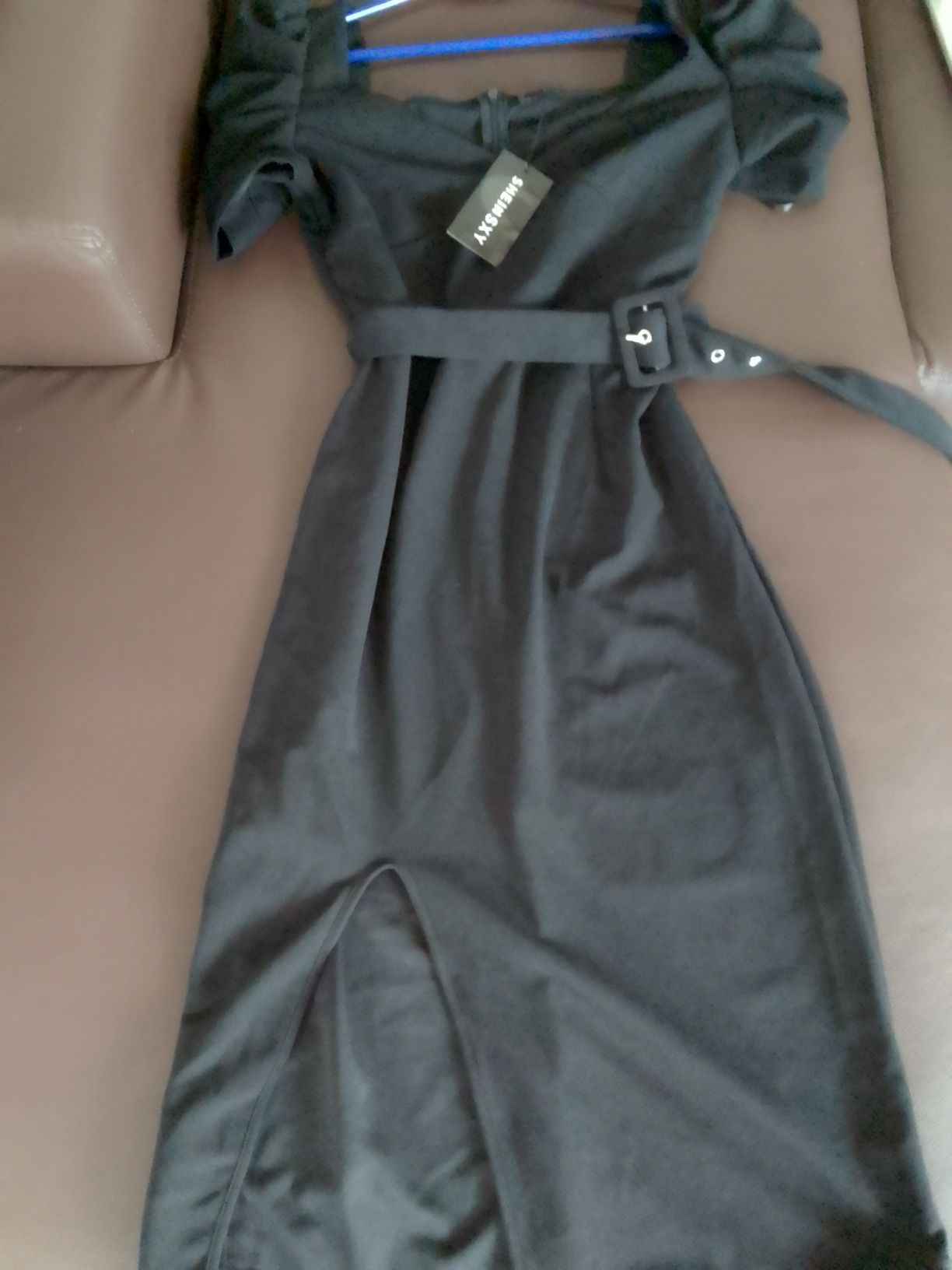 Nowa ,czarna elegancka sukienka Shein rozmiar 36.
Nowa z metką.