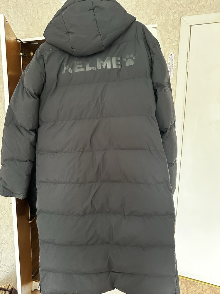 Продам длинную зимнюю куртку Кelme