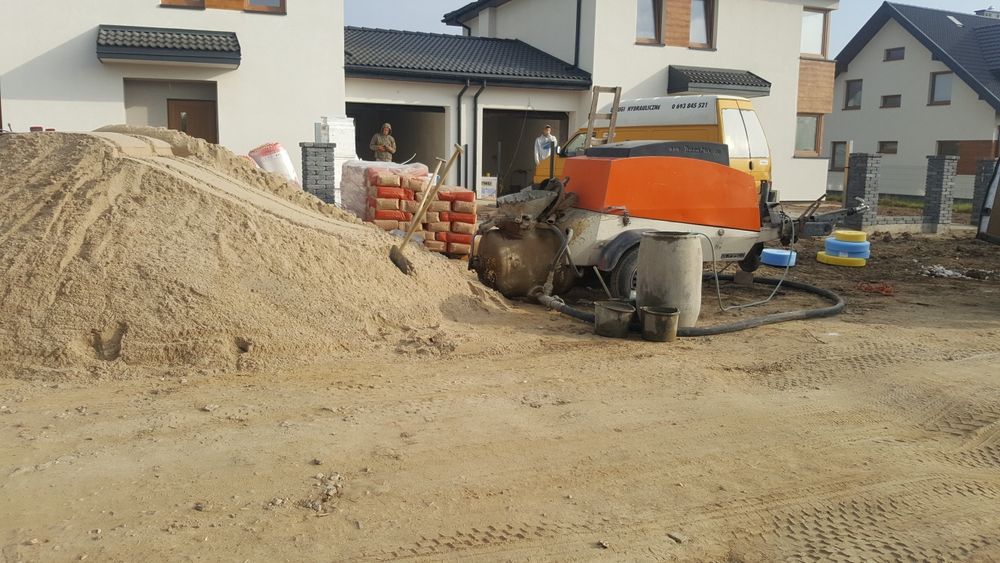 Posadzki wylewki betonowe mixokretem.Układanie styropianu.STYROBETON