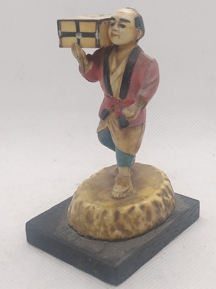 Figura antiga de camponês chinês