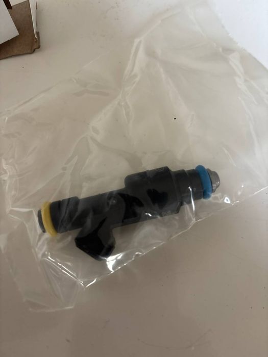 Форсунка Опель Opel 1.6  z16ng 55576400 нові оригінал