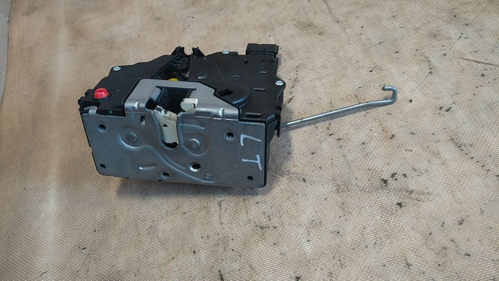 ) Meriva B zamek drzwi lewy tył