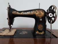 Maquina de Costura Singer.