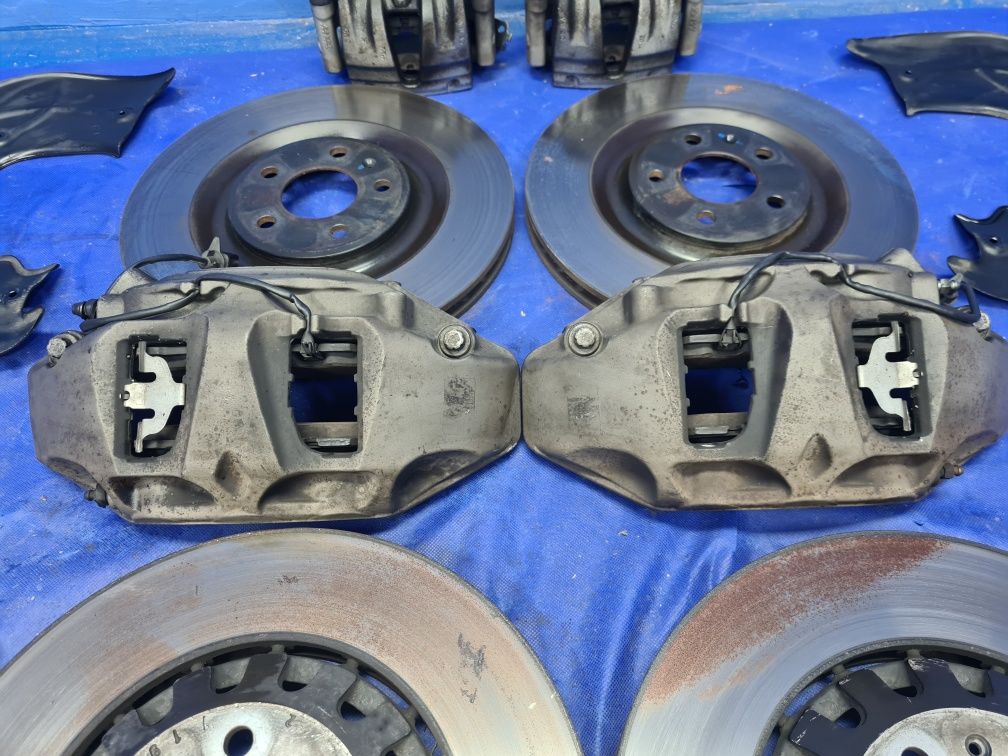 KOMPLET tarcz 375mm 340mm zaciski 6-tłoczkowe AUDI Q7 4M A6 C7 C8 OEM