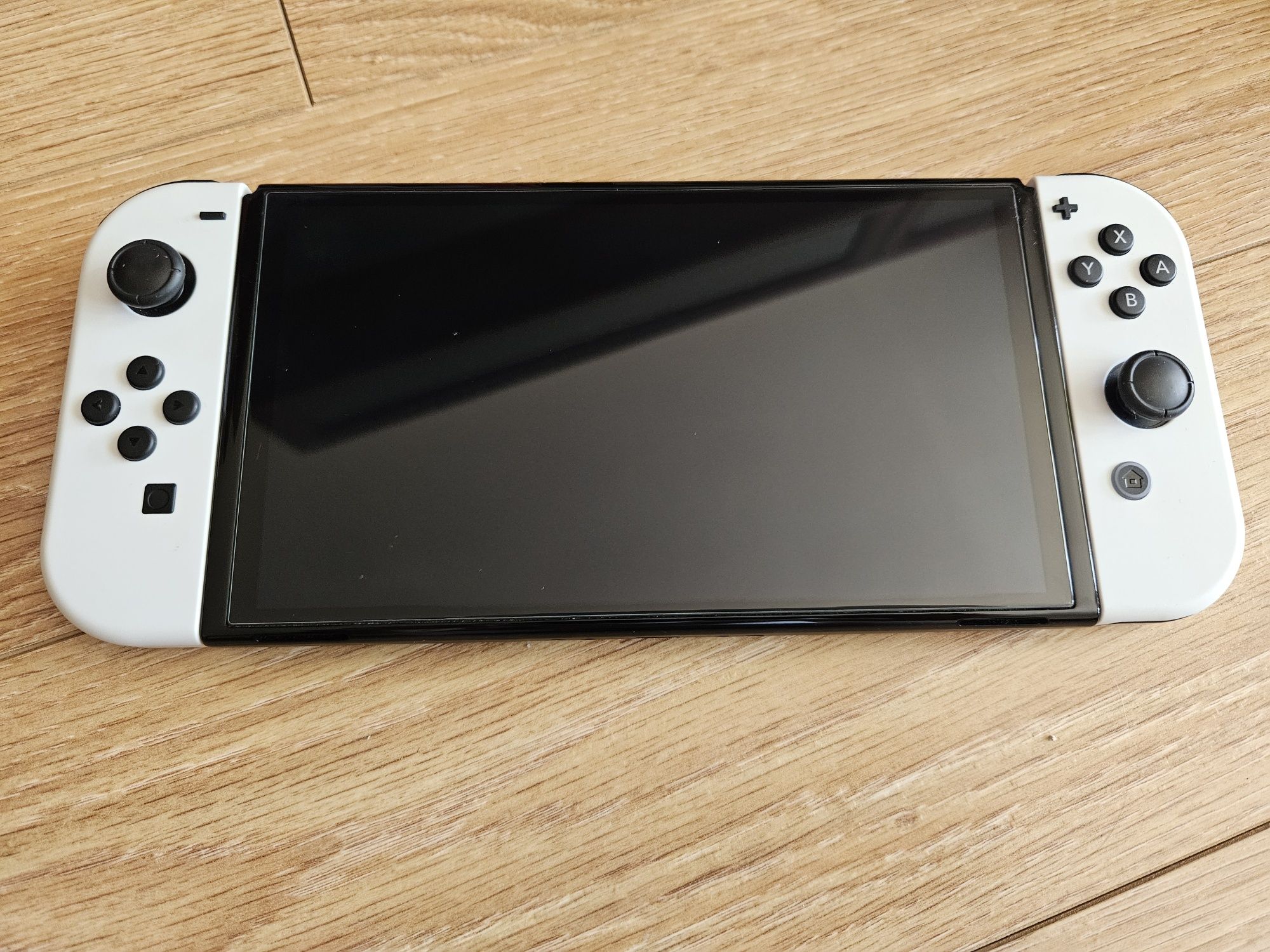 Nintendo Switch OLED + Pro Controller