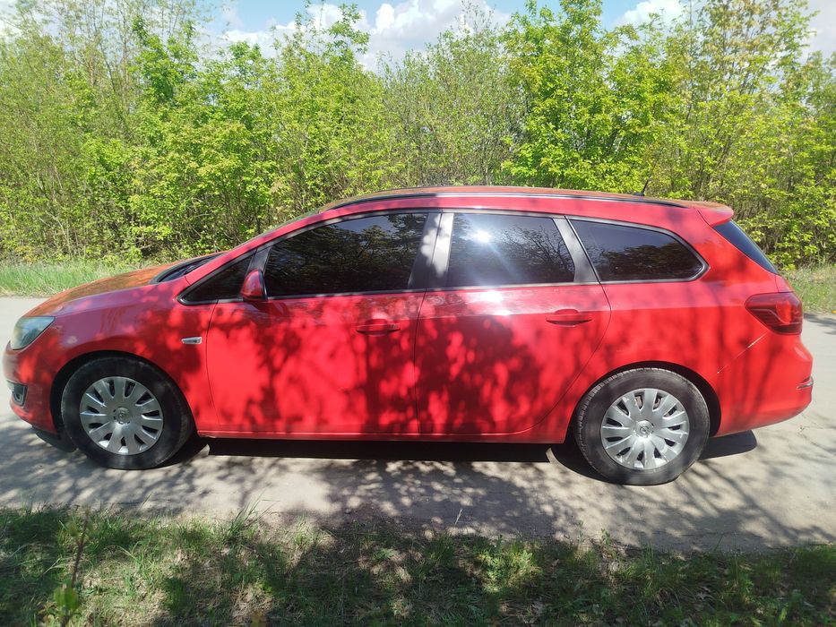 Опель Astra j sports tourer 1.3 cdti