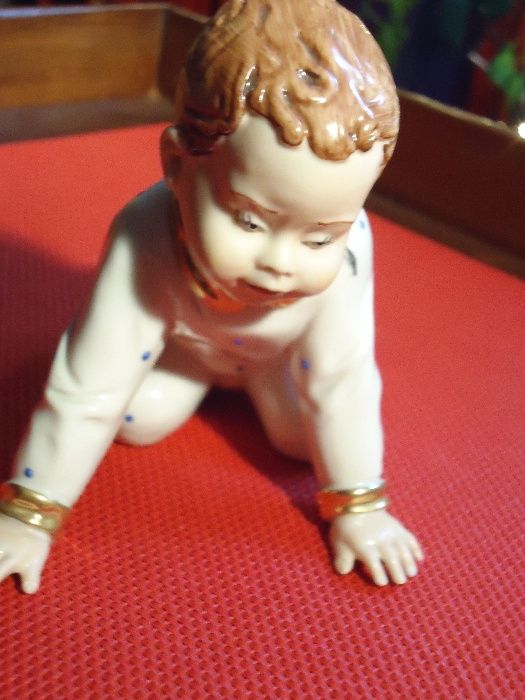 Porcelana fina bebé Antigo