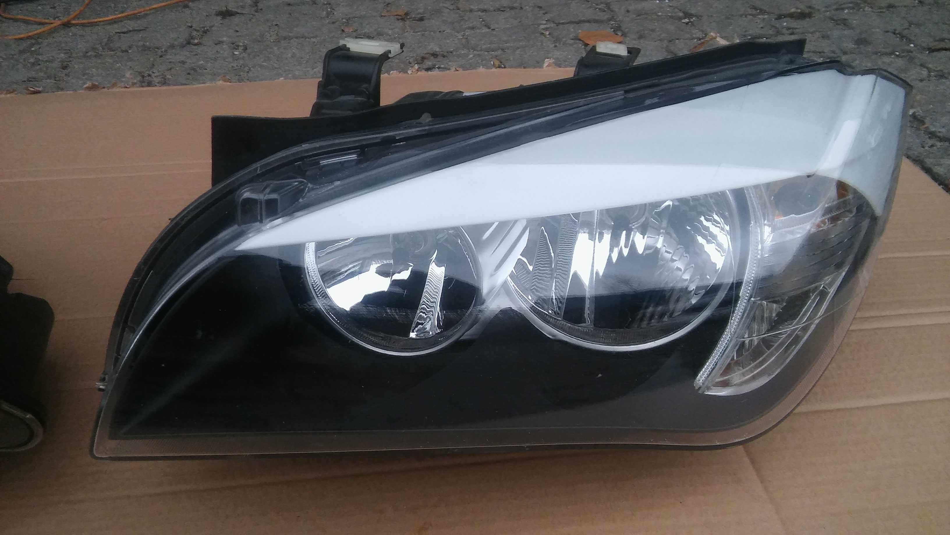 BMW X1,E84 Lift,od 11r,lampa przód,Lewa+Prawa,zwykła,H7,oryginał,ZKW