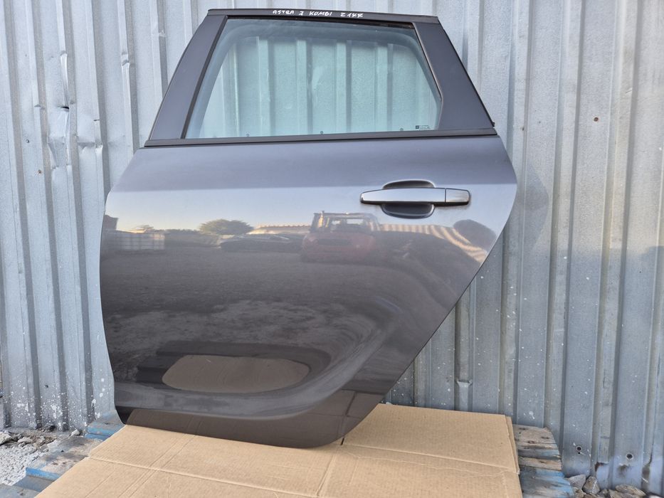 Drzwi lewe tylne Opel Astra J  KOMBI  Z177