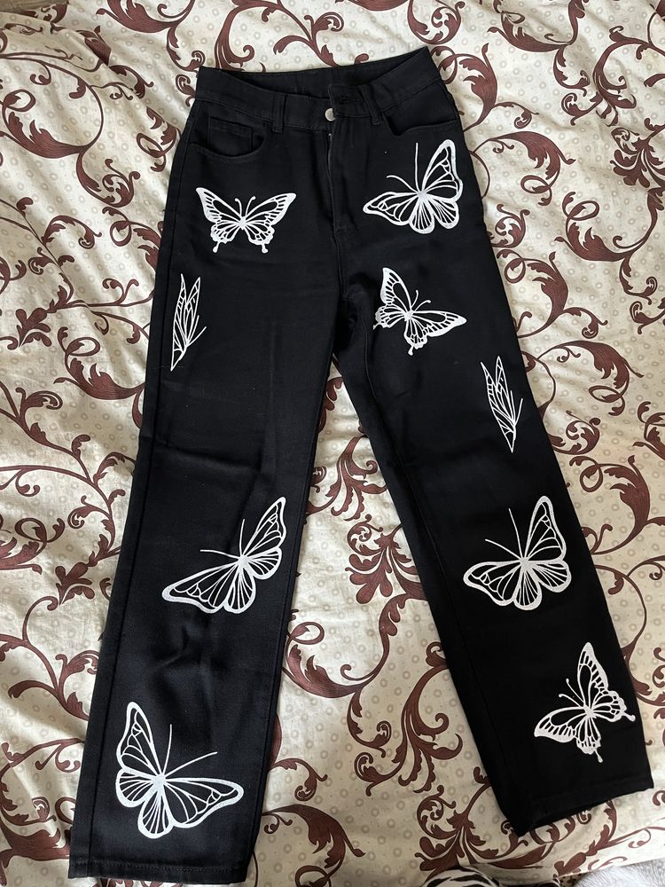 джинси з метеликами