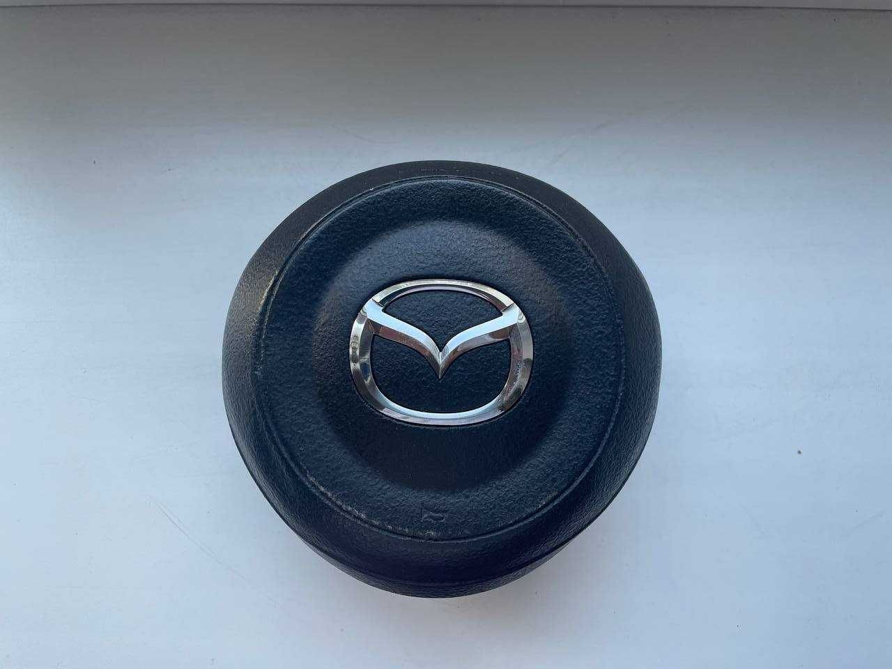 Обманка, подушка безопастности Mazda