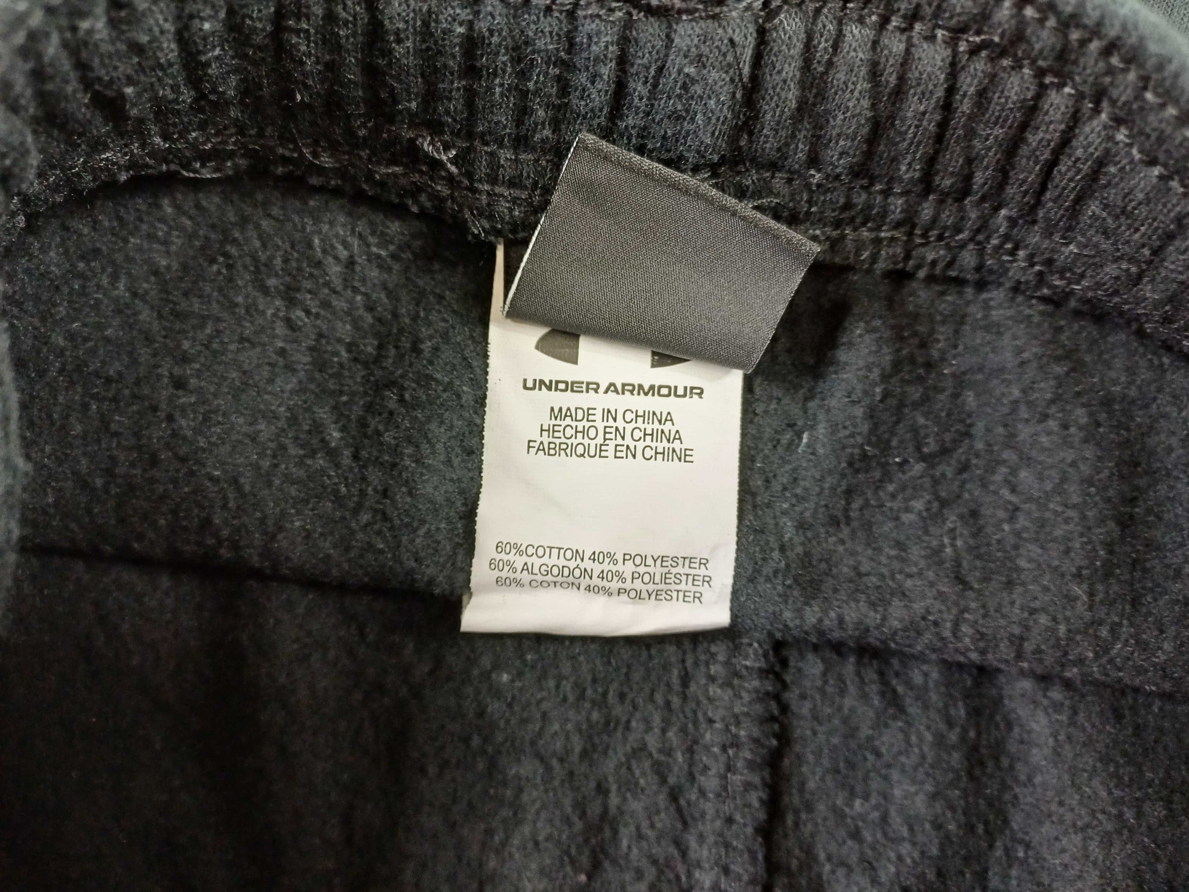 Spodnie dresowe UNDER ARMOUR r 110