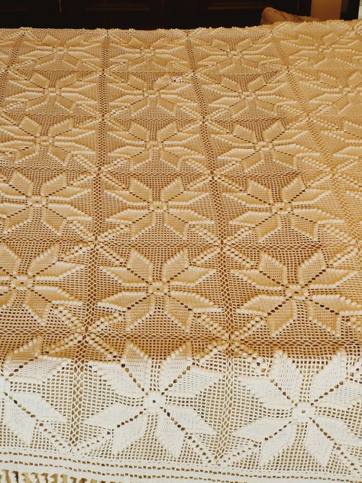 Colchas de renda trabalhadas à mão