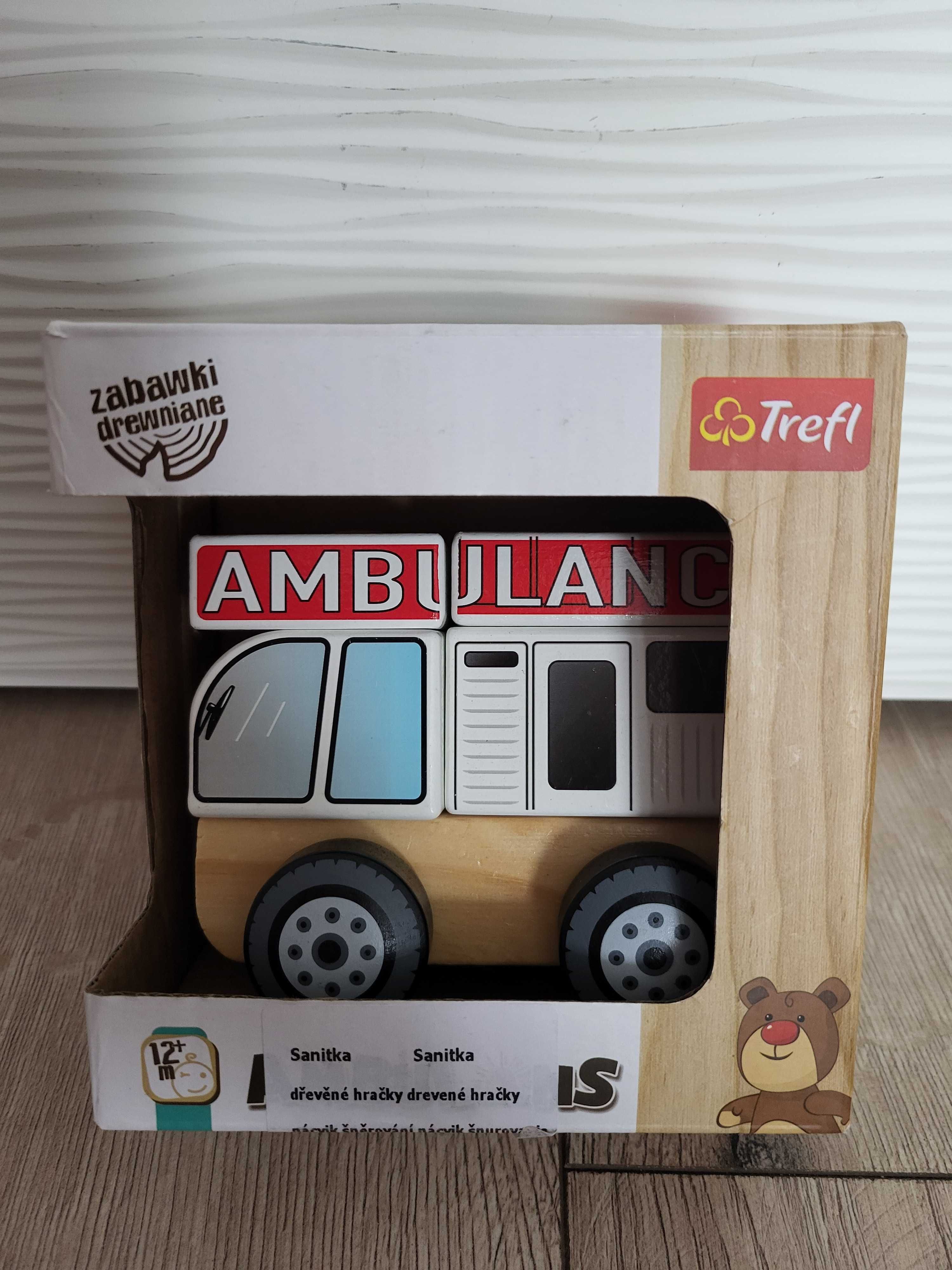 Drewniany ambulans Trefl, zabawka karetka, pojazd, autko