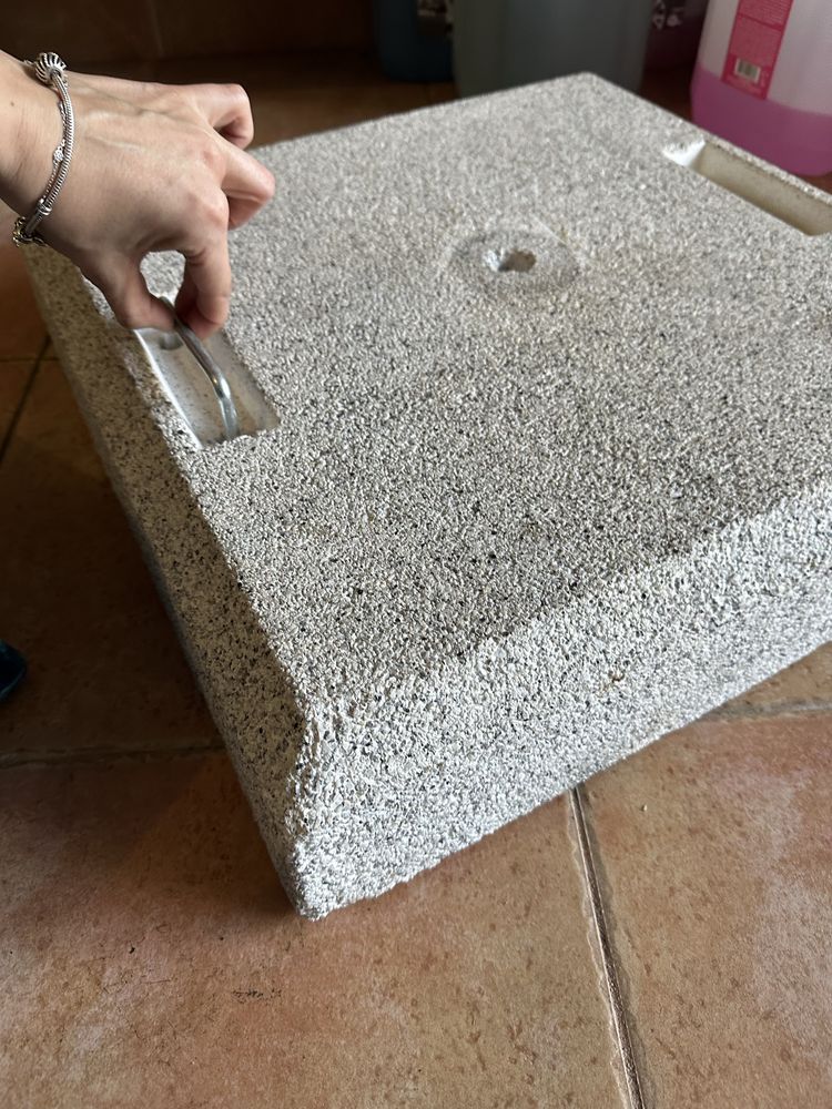 Bases de pedra para chapéu de sol