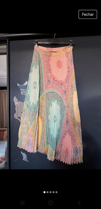 Saia  Twin set em estado novo