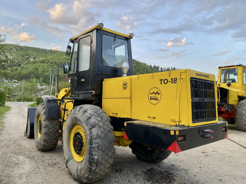 Амкадор ТО-18 навантажувач