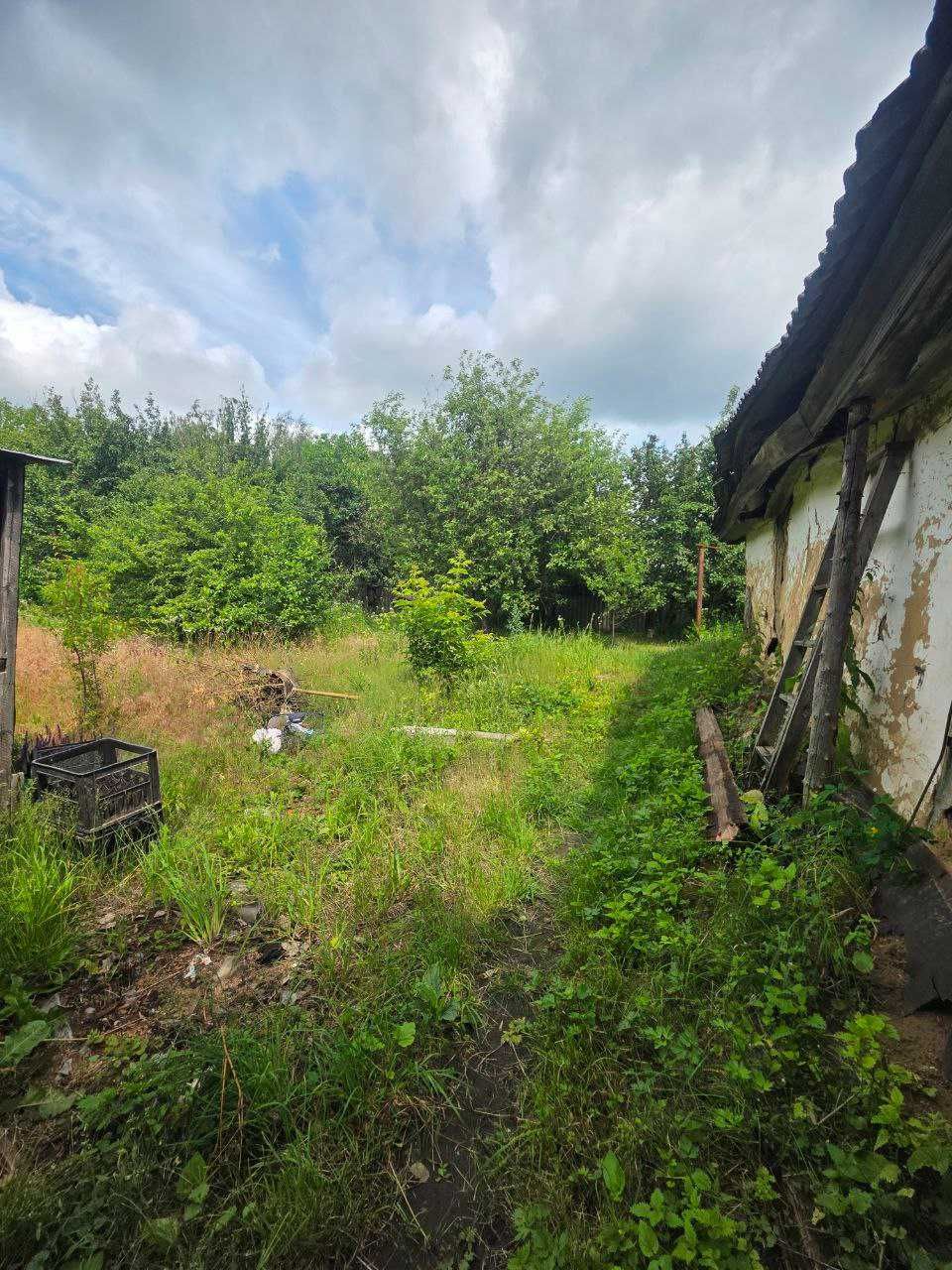 Продам земельну ділянку з будинком