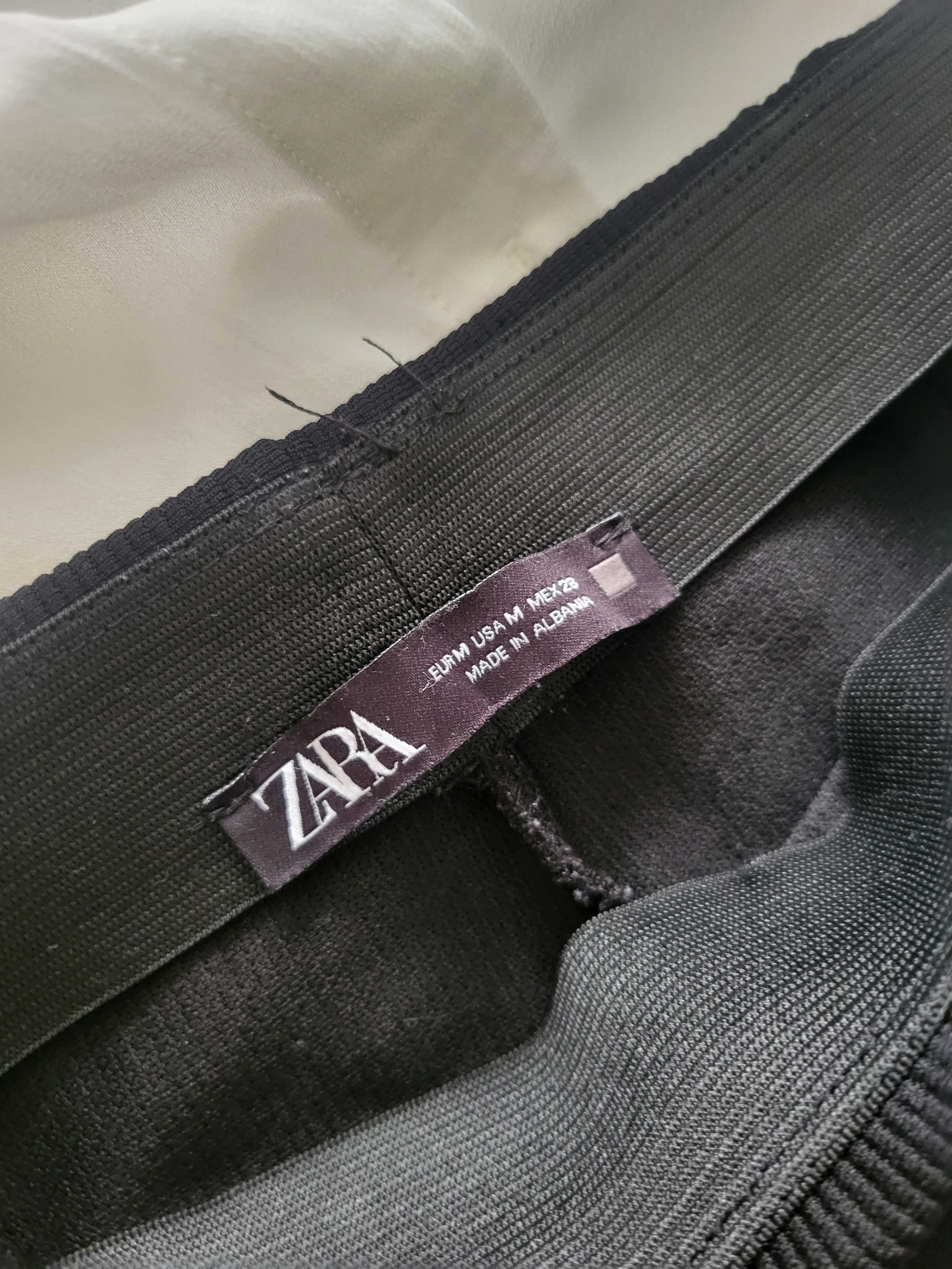 Zara штани в рубчик з розрізами