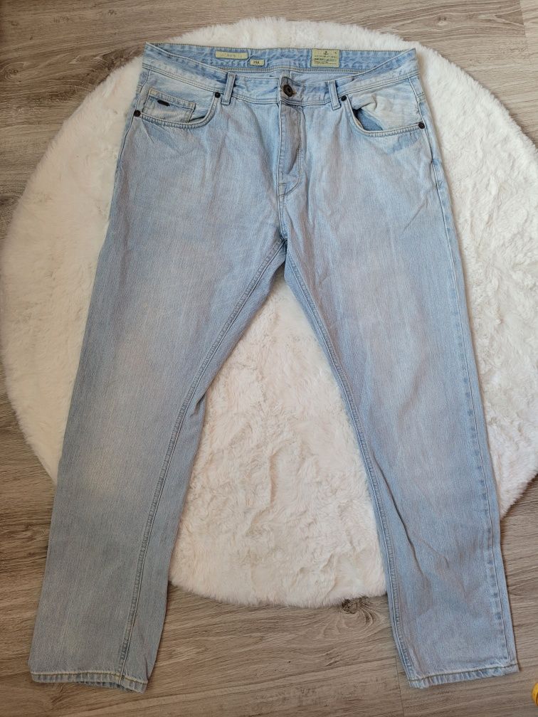 Jasne męskie spodnie jeans 46