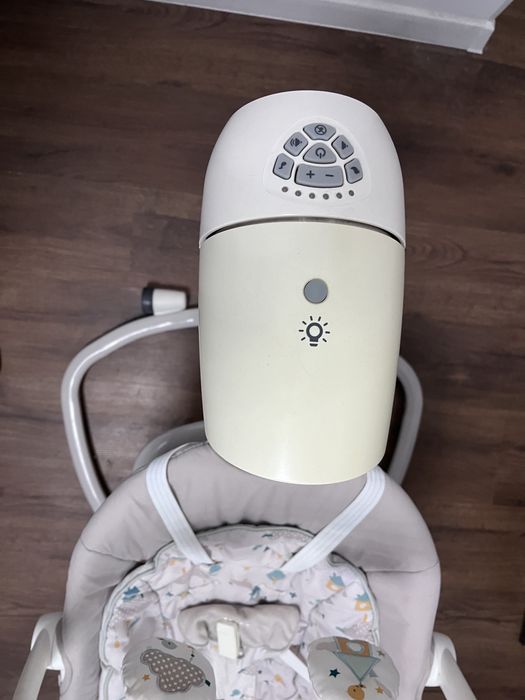 Дитячий шезлонг, заколисуючий центр, каталка, крісло гойдалка