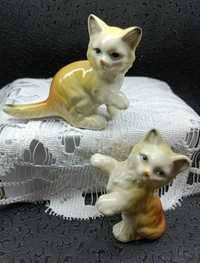 Zabytkowe porcelanowe figurki kotów