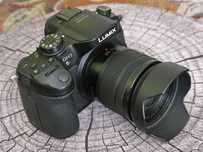 PANASONIC LUMIX DMC-GH3 z obiektywem oraz oryginalnym gripem