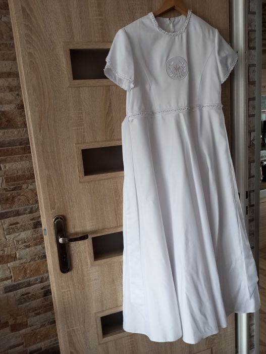 Sprzedam albę komunijną z bolerkiem.