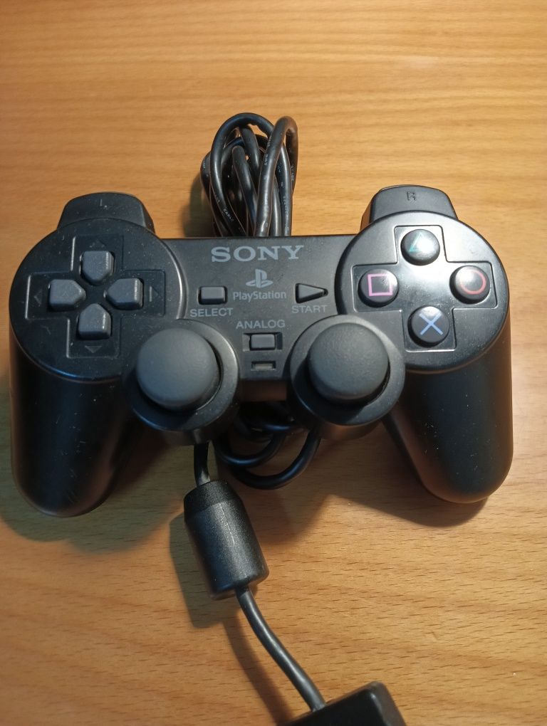 PlayStation 2 + comando original + memory card + 7 jogos (ótimo estado