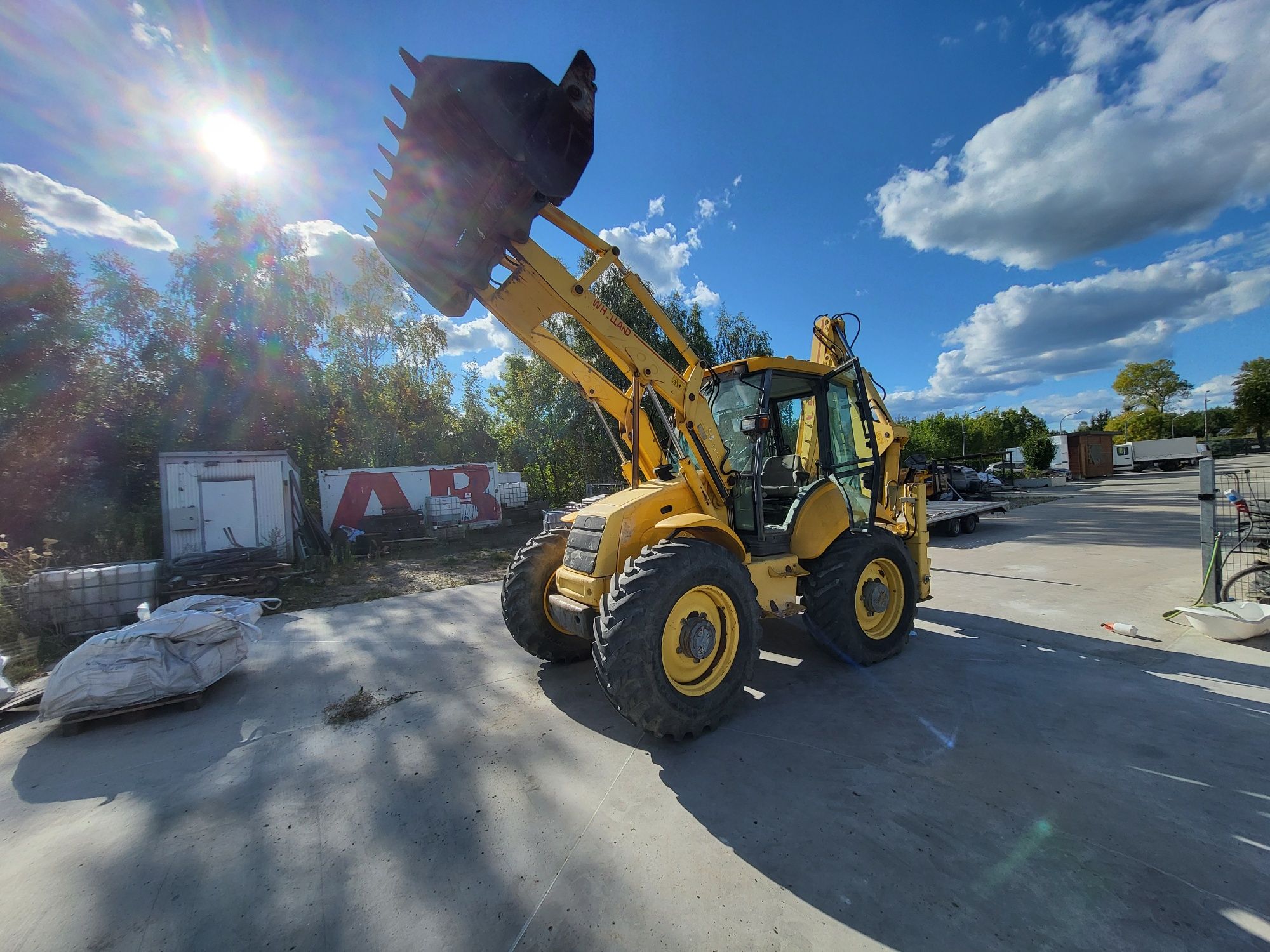 New holland lb 115 klima powershift koparko ładowarka