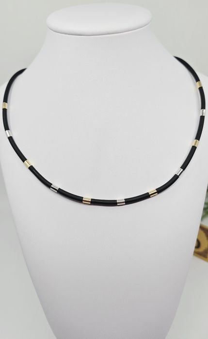 Naszyjnik na kauczuku ze złotymi elementami próba 585 14k 
- Waga: g